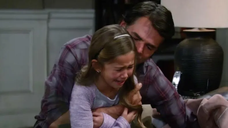 Emma Scorpio is overcome with emotion upon hearing heartbreaking news, leading Gio to comfort her with a kiss.