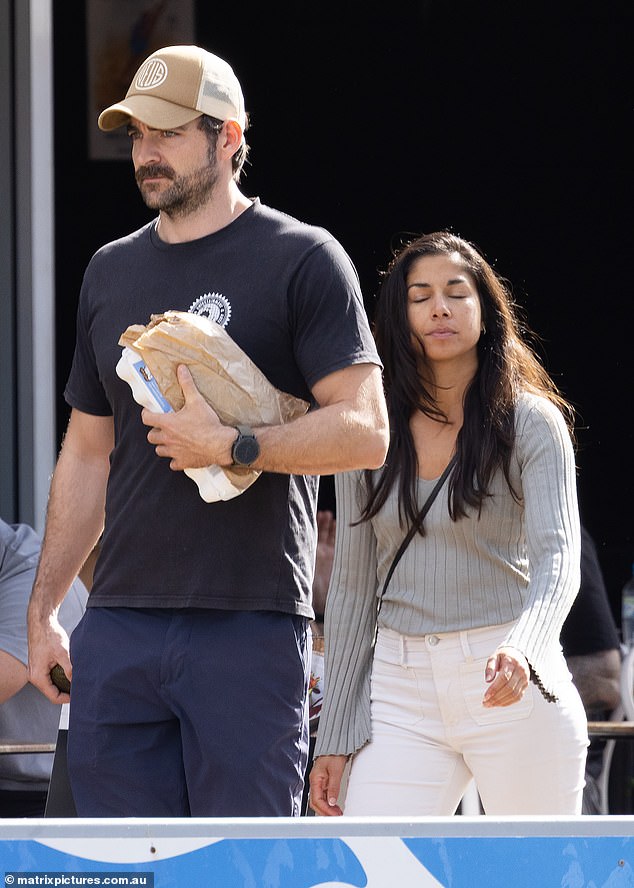 Sarah Roberts finds love again following heartbreaking divorce from James Stewart as she is spotted holding hands with new man in Sydney